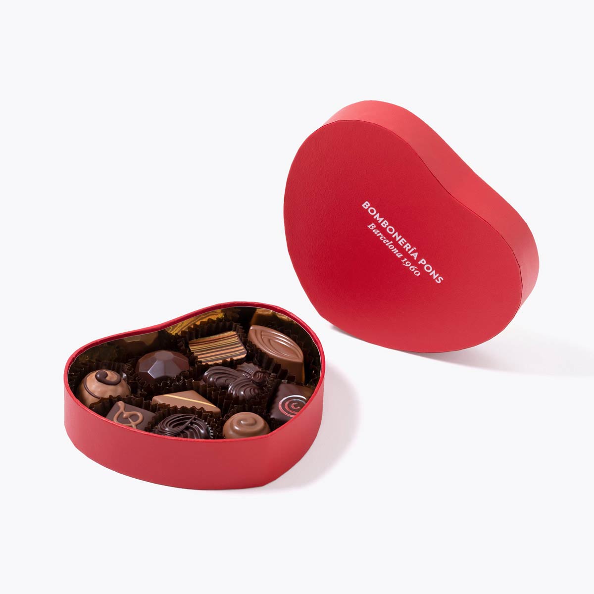Bombones surtidos caja corazon 150g, disponible en presentación a granel.