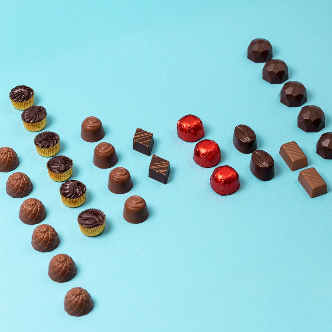 Bombones combinados sin azucar caja 600g, presentación a granel.