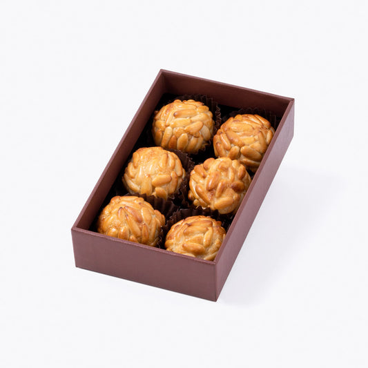 Presentación de Panellets de pinones caja 6 uds, en formato a granel.