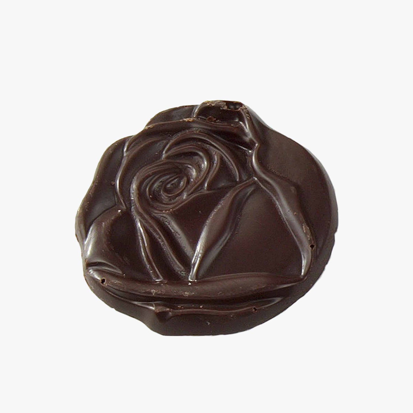 Flores de chocolate negras tubo 110g, disponible en presentación a granel.