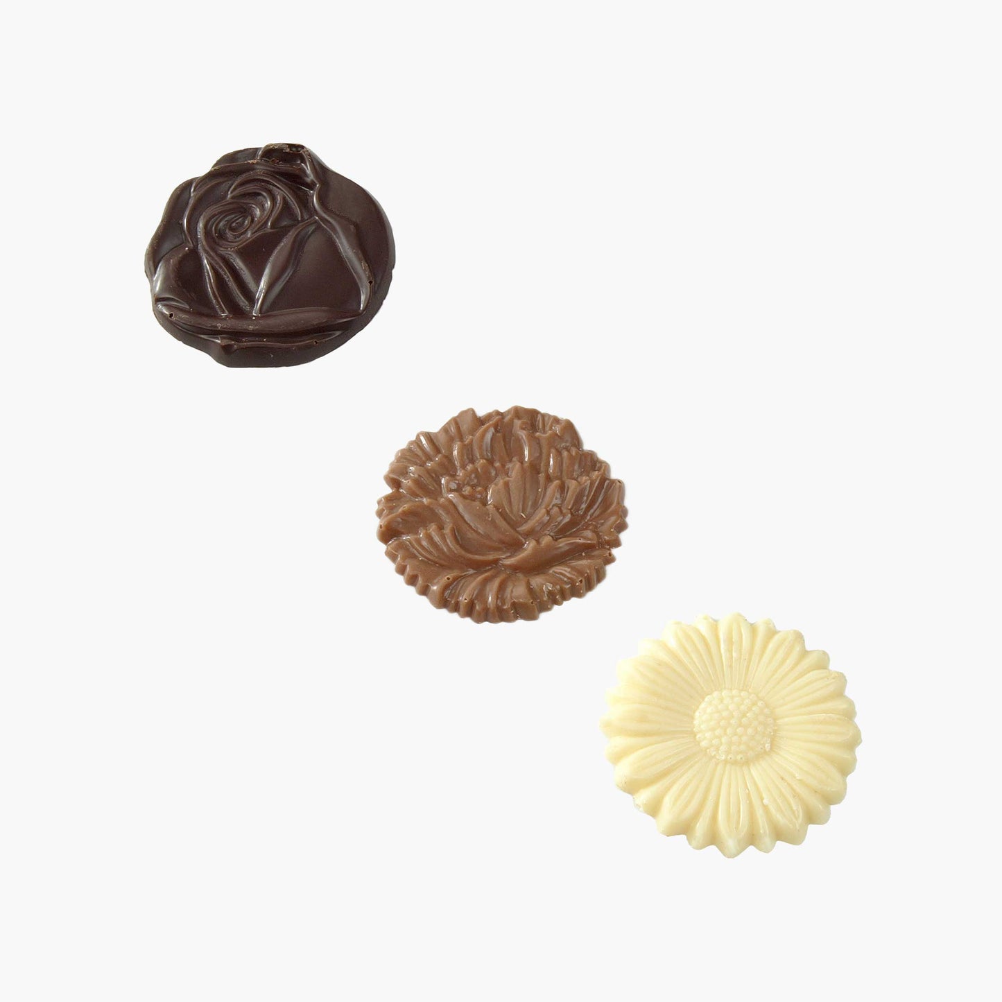 Flores de chocolate surtidas tubo 230g, disponible en presentación a granel.