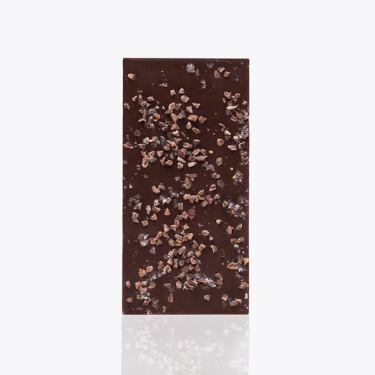 Tableta con nibs y sal 130g, presentación a granel.