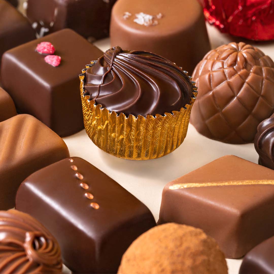 Bombones surtidos bandeja 130g, disponible en presentación a granel.