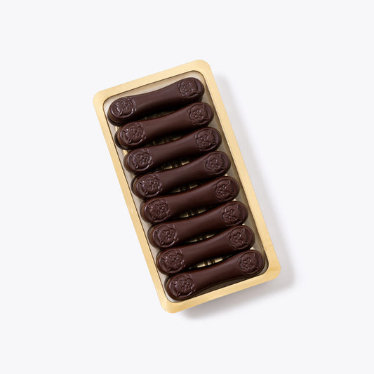 Producto a granel: Lenguas de gato negras bandeja 130g.