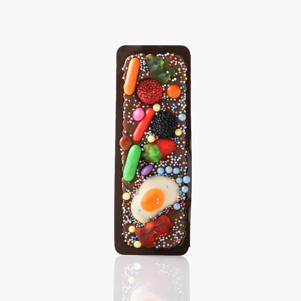 Chuches leche 40g chocolatina, disponible en presentación a granel.