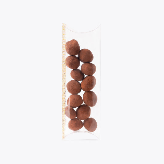Macadamias al cacao funda 100g, presentación a granel.