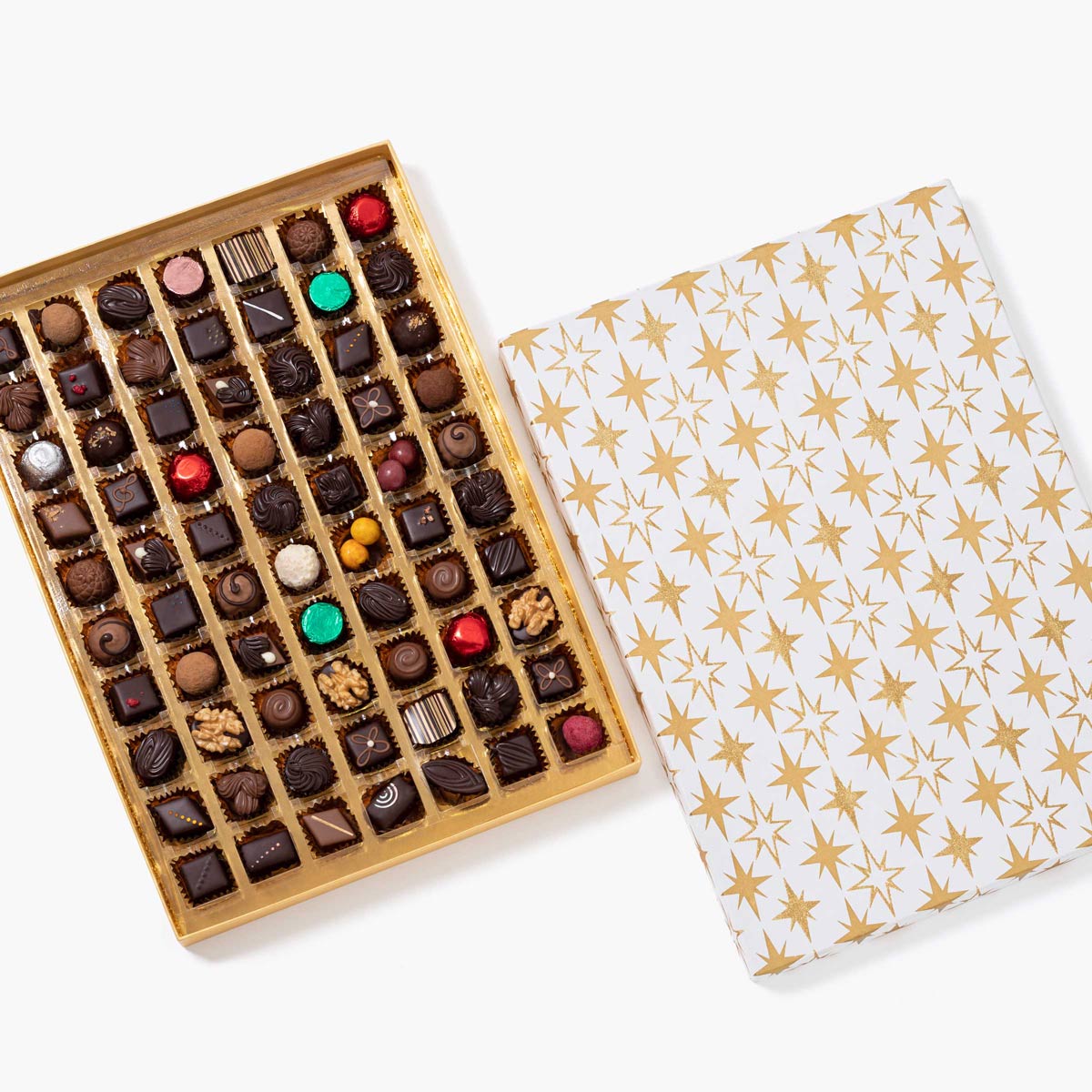 Bombones surtidos caja lujo 70uds, disponible en presentación a granel.