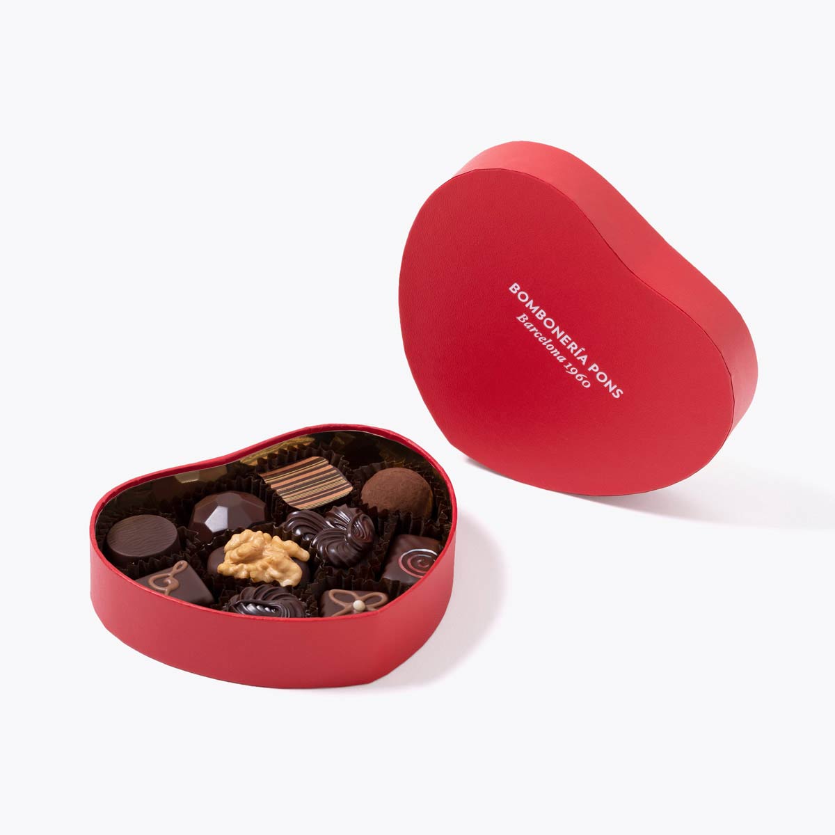 Presentación de Bombones negros caja corazon 150g, en formato a granel.